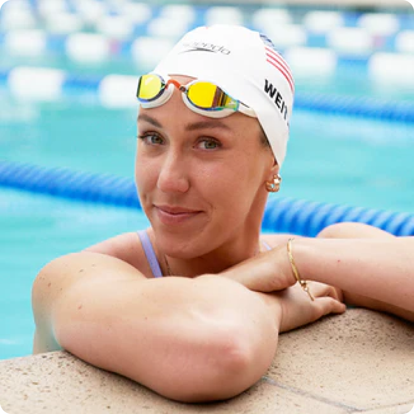 Abbey Weitzel in the pool after clearing her acne with a Face Reality Acne Expert. 