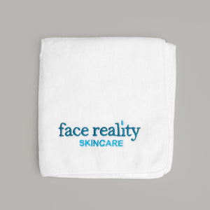 White folded square of Face reality treatment towel